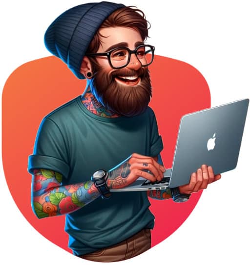 Man with tattoos using a laptop, smiling.